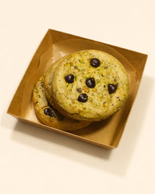 vegan pistachio chocolate cookie with roasted pistachios, pistachio butter, toasted kataifi, dark chocolate chips