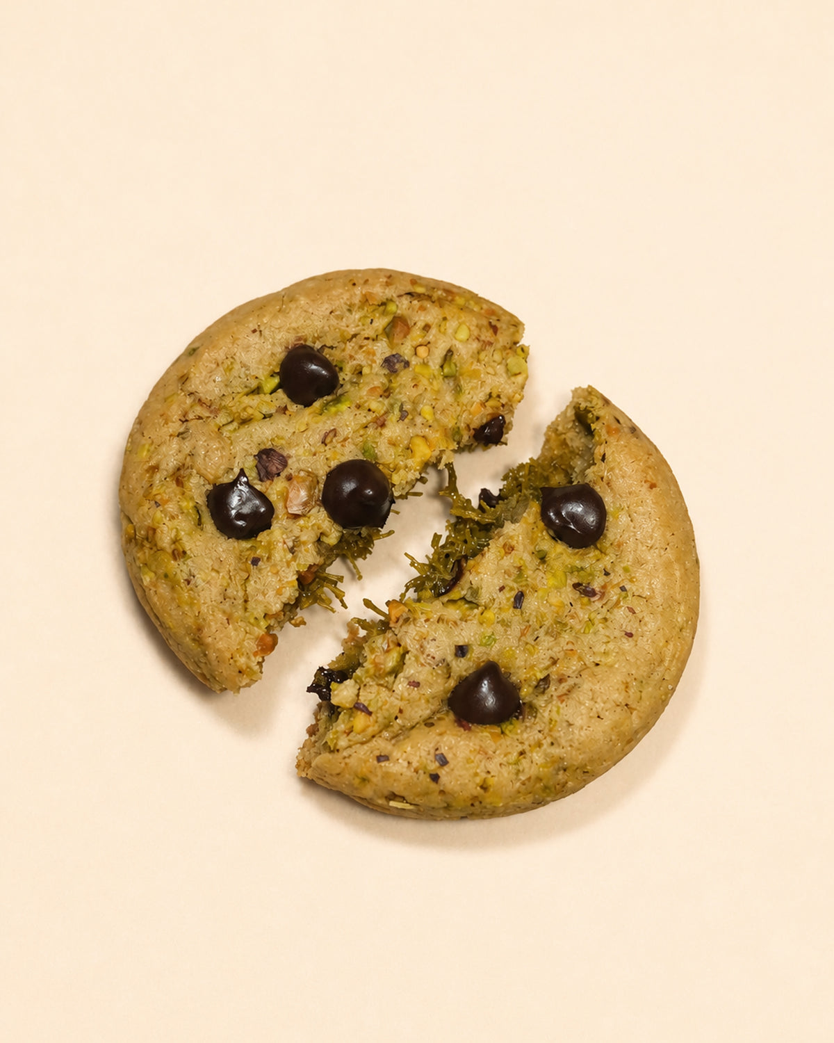 vegan pistachio chocolate cookie with roasted pistachios, pistachio butter, toasted kataifi, dark chocolate chips